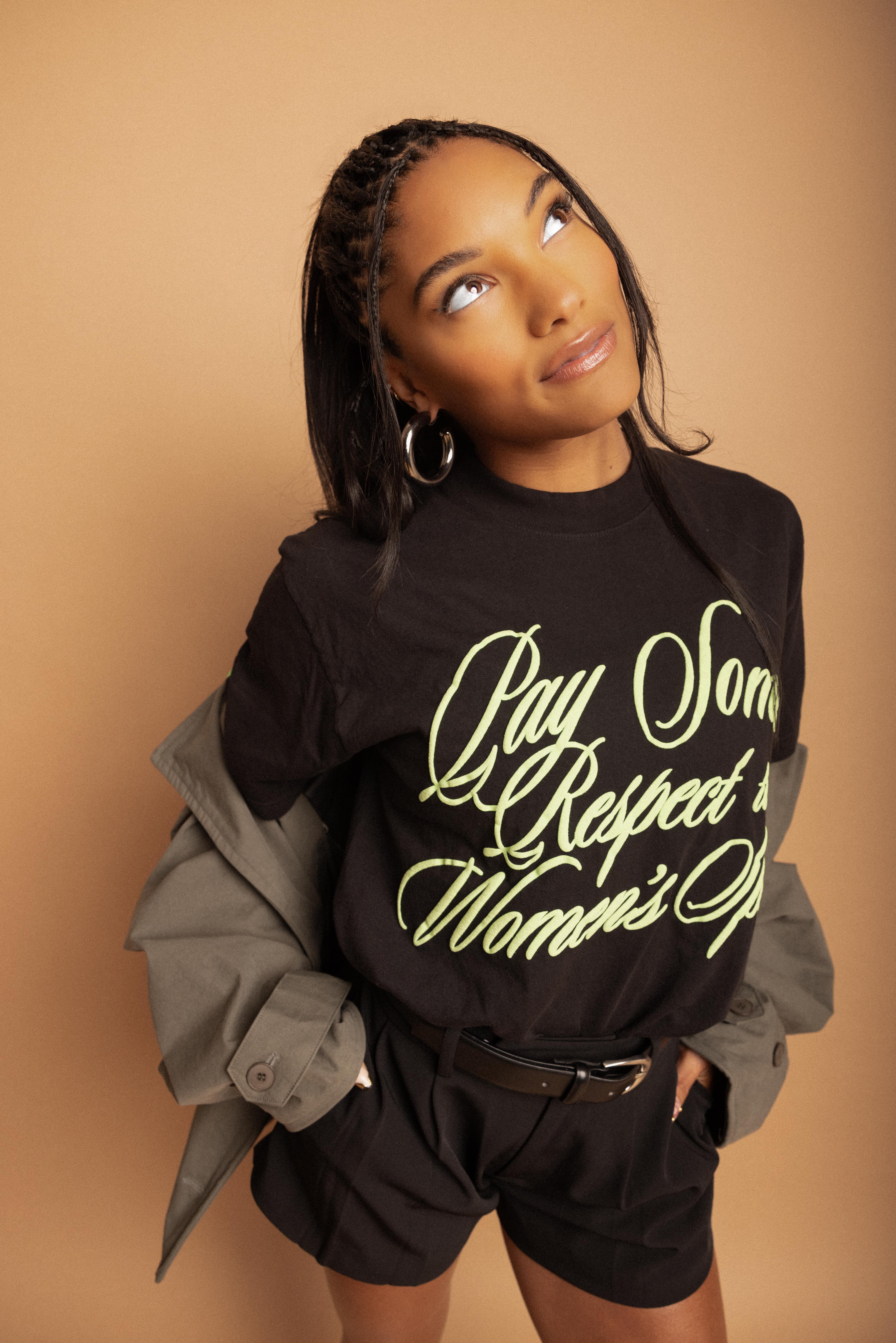 Snow-capped mountains viewed through a car window.