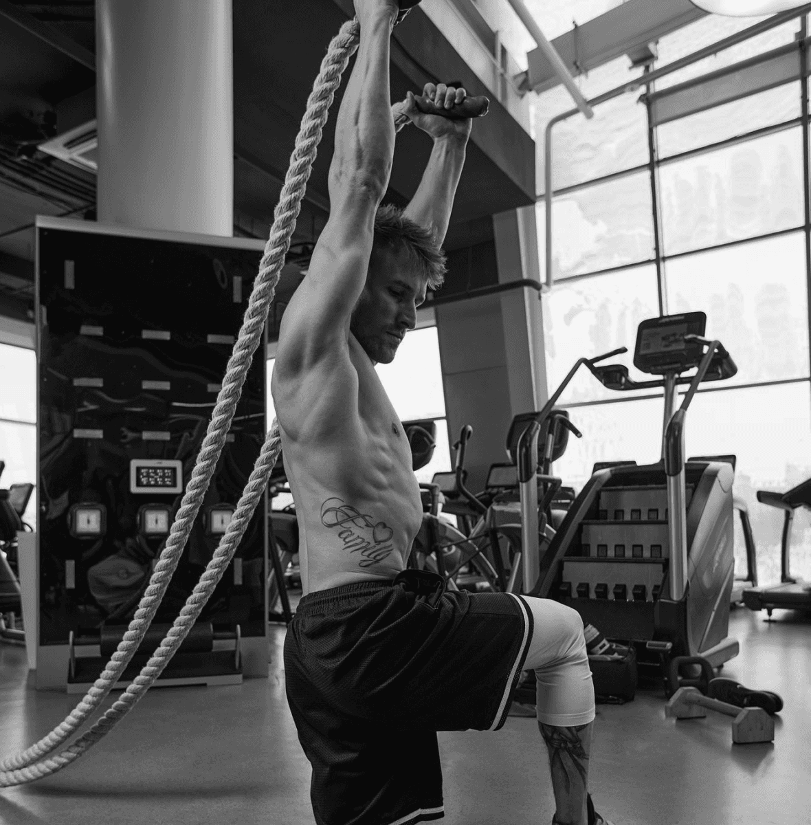 Man using TRX for strength and stability training