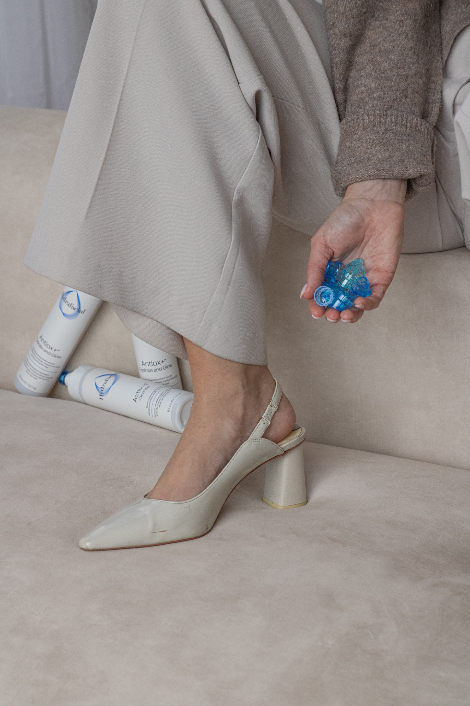 A room with a table, chairs, and a clock