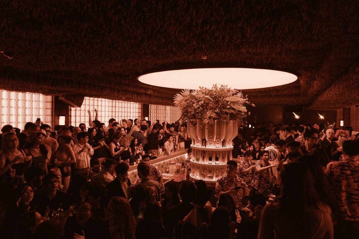 Bam Saigon Bali-inspired tropical bar interior with moody lighting in Ben Thanh district