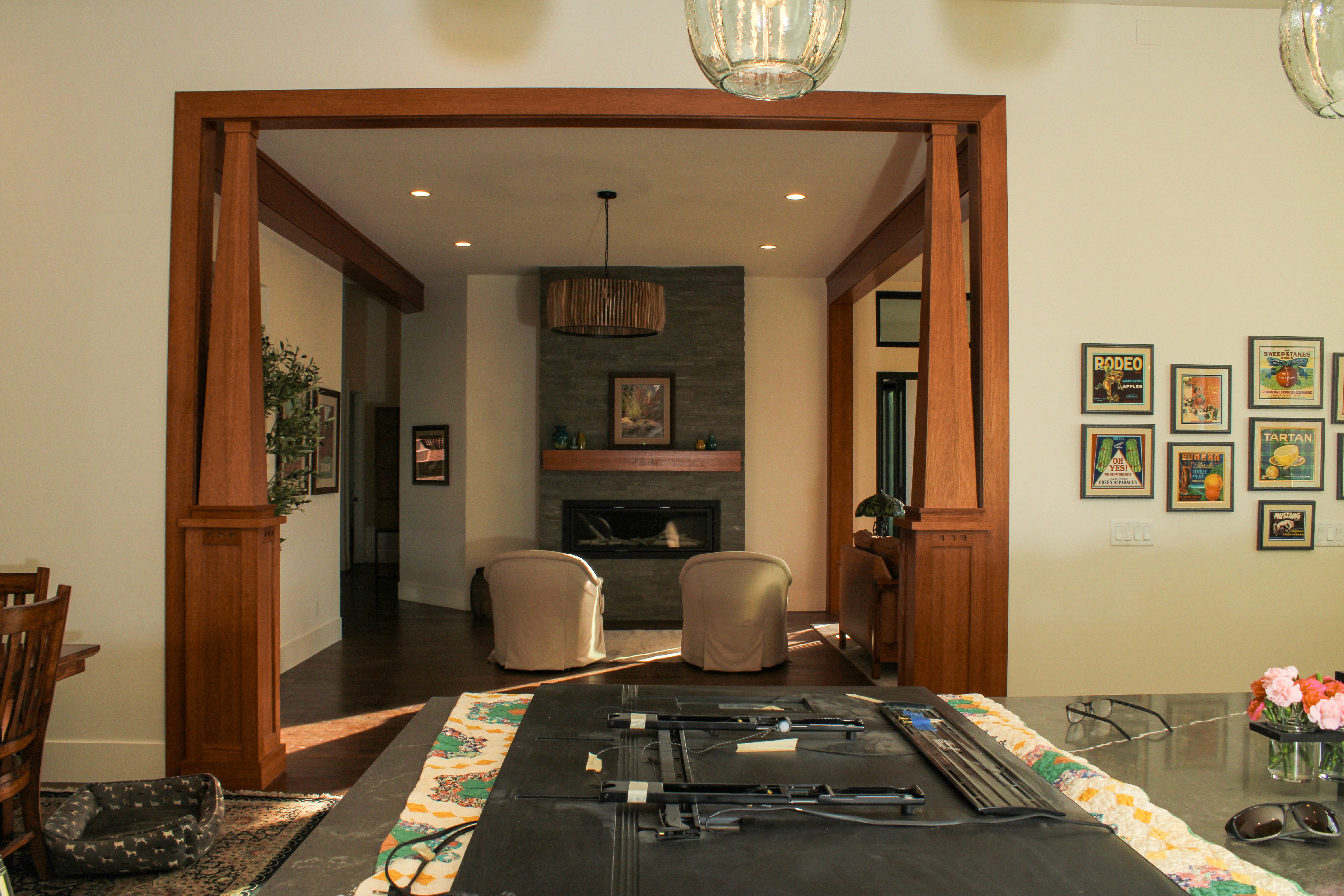 Open-concept kitchen to living area with wood accents and retro-modern design in Southern Utah