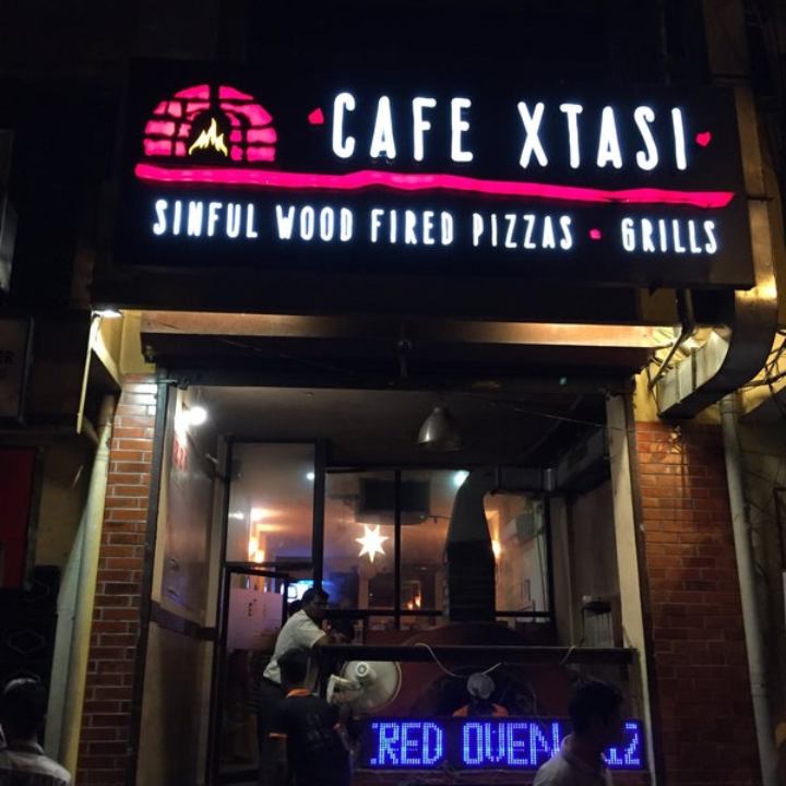 Storefront of Cafe Xtasi.