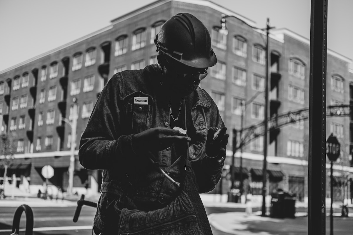 Contractor using a phone on site
