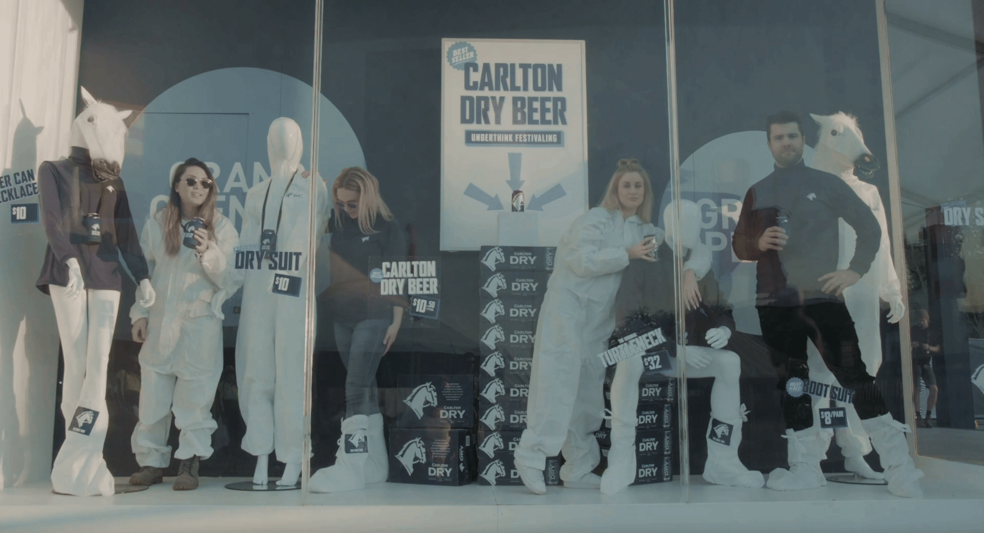 Streetside billboard with flyposters of the Batch.Works brand and illustrations