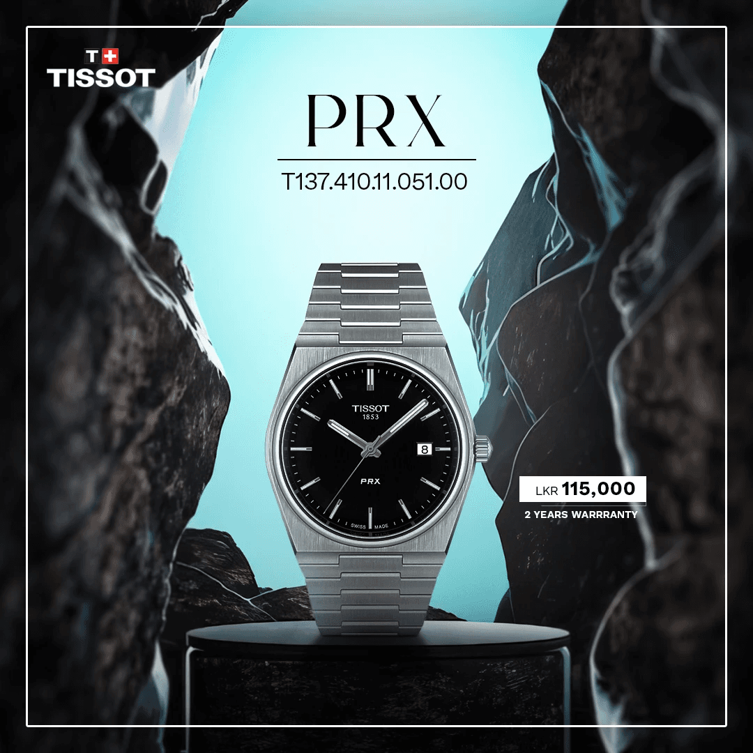 The image showcases a Tissot PRX wristwatch with a sleek silver bracelet and a black dial, elegantly displayed against a backdrop of rugged, abstract rock formations, highlighting its modern design and craftsmanship.