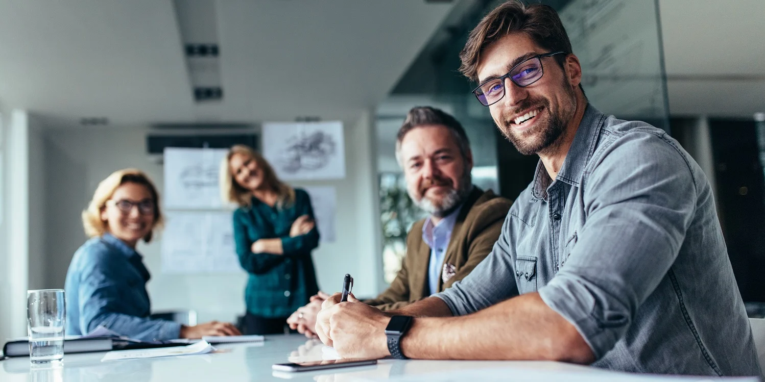 lady checking her phone and smiling