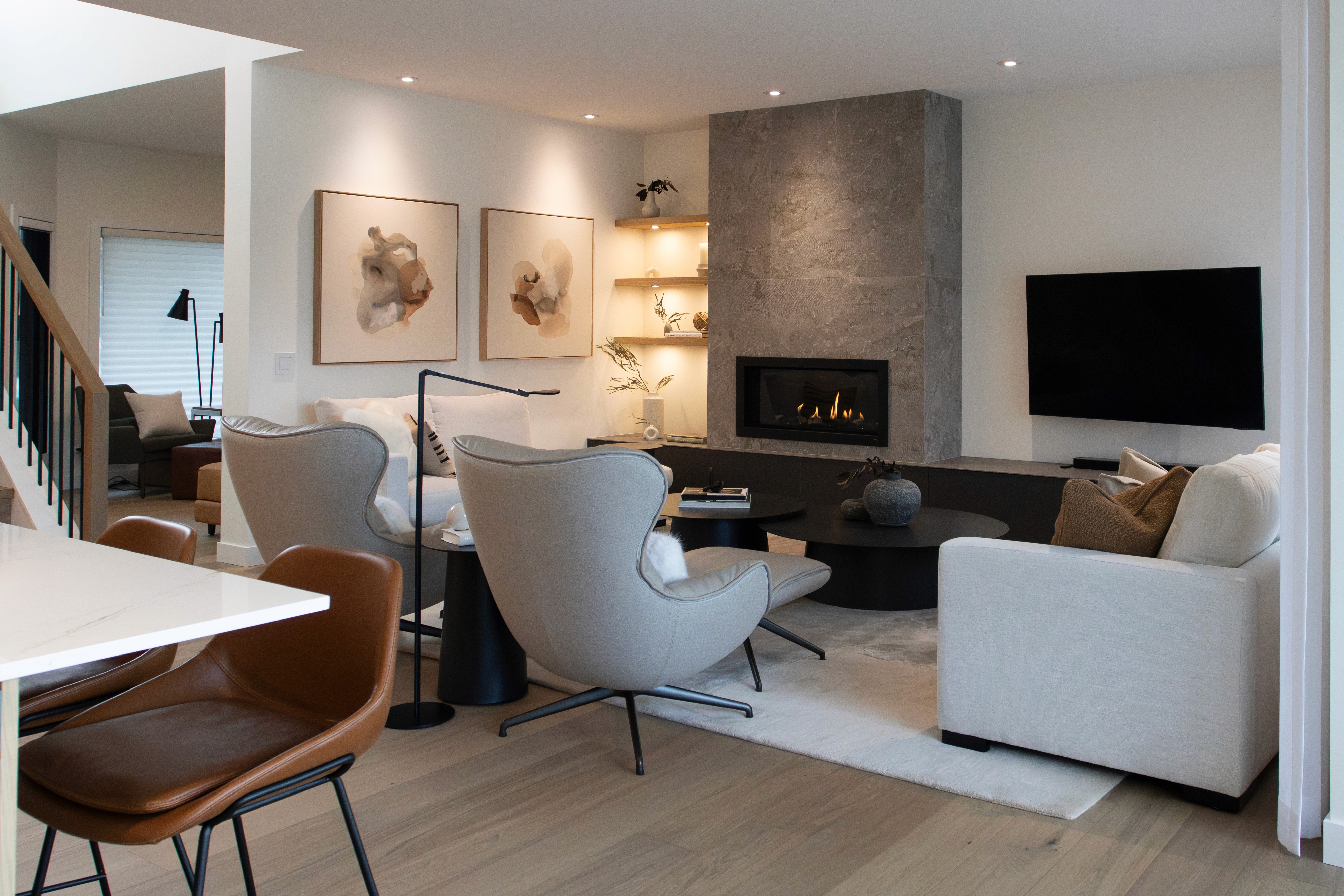 Image of Luxury living room interior design with furniture, window coverings, and layout design by a design-build home builder.