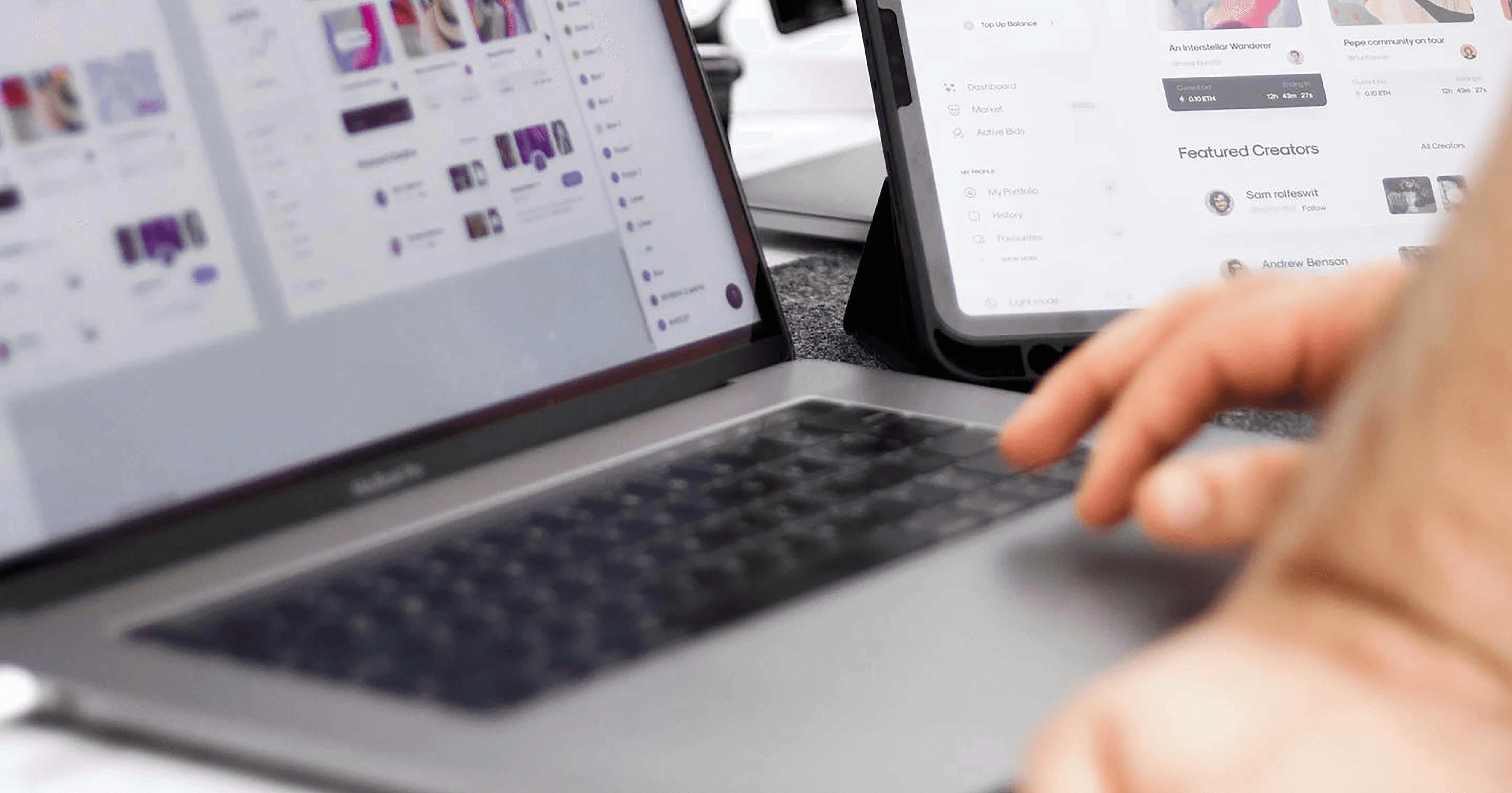 A closeup of a person organizing files on their laptop and tablet devices. Photo by Afshin T2Y on Unsplash