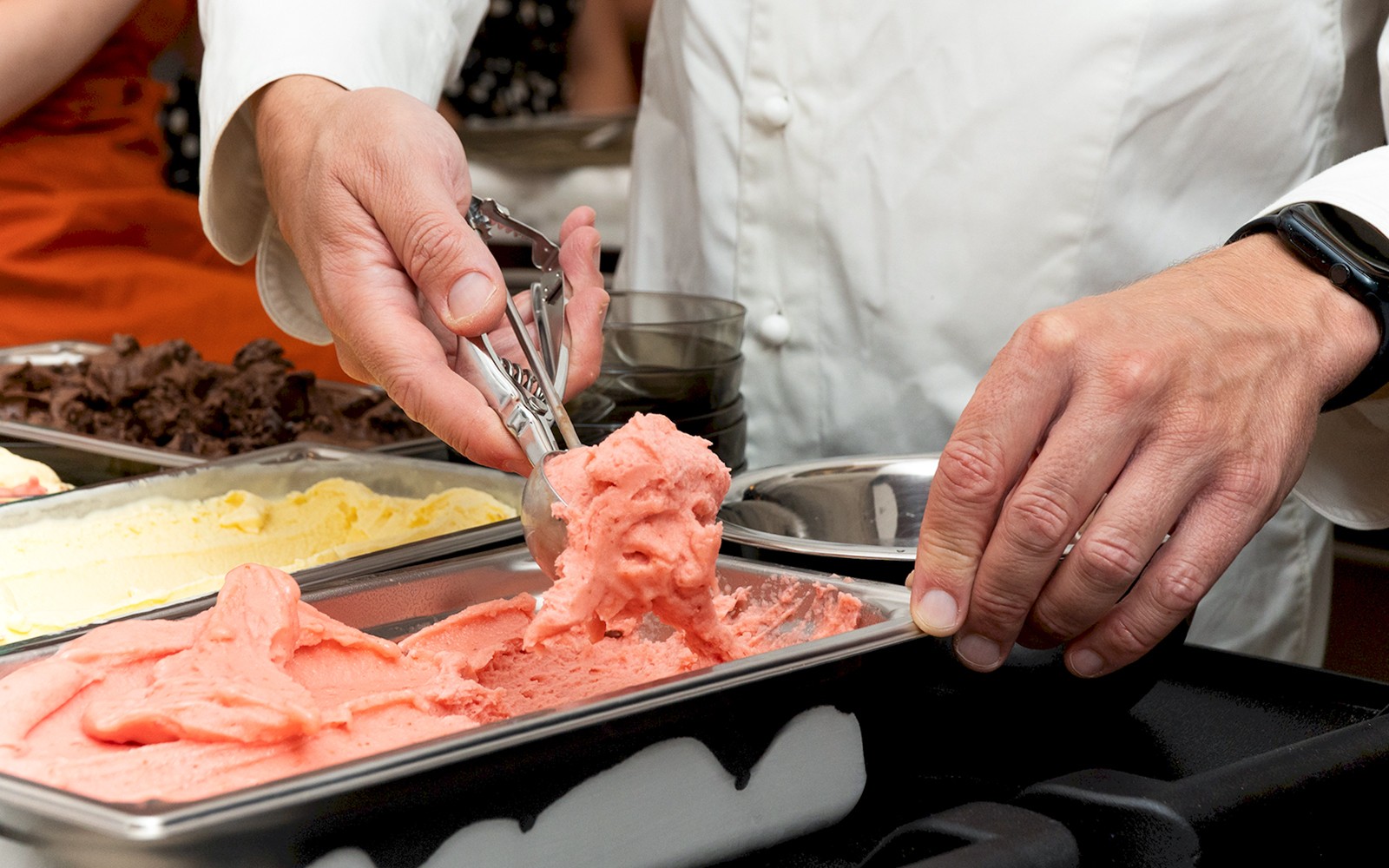 Gelato making class in Rome with fresh creamy gelato being prepared.