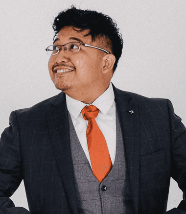 Smiling Man in pink Shirt