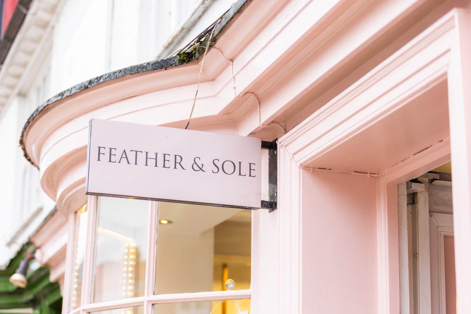 Feather & Sole entrance sign