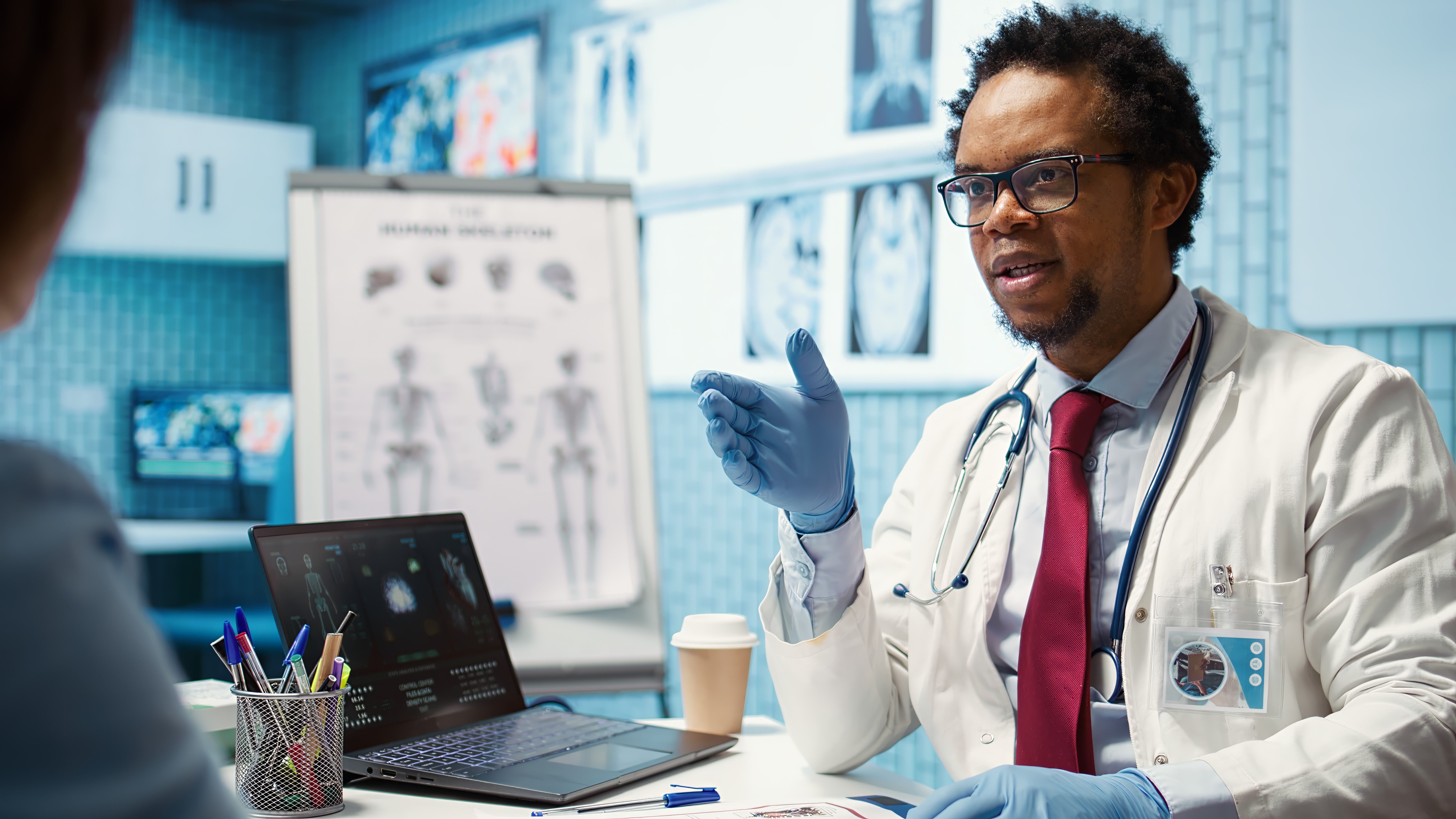 Two surgeons working in a hospital with the hands of a human heart