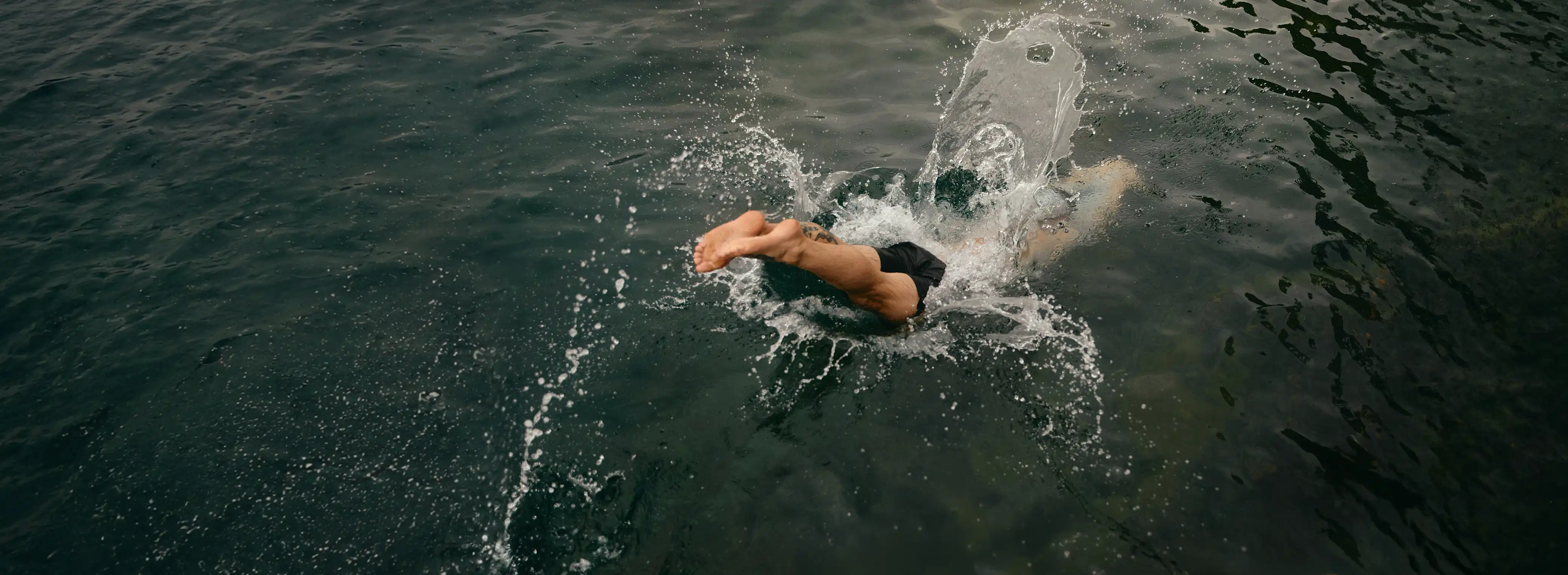 Open-water swimming reflecting vitality, resilience, and an active approach to lifelong health and wellbeing.