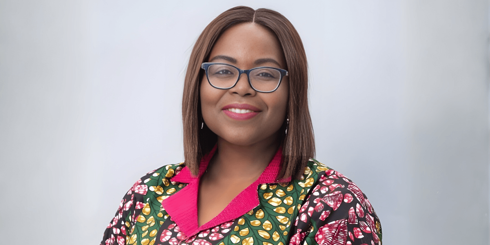 Olubukola Sanni, Global Mobility Tax Lead for Baker Hughes, a key figure in Nigeria’s energy sector, smiling confidently.