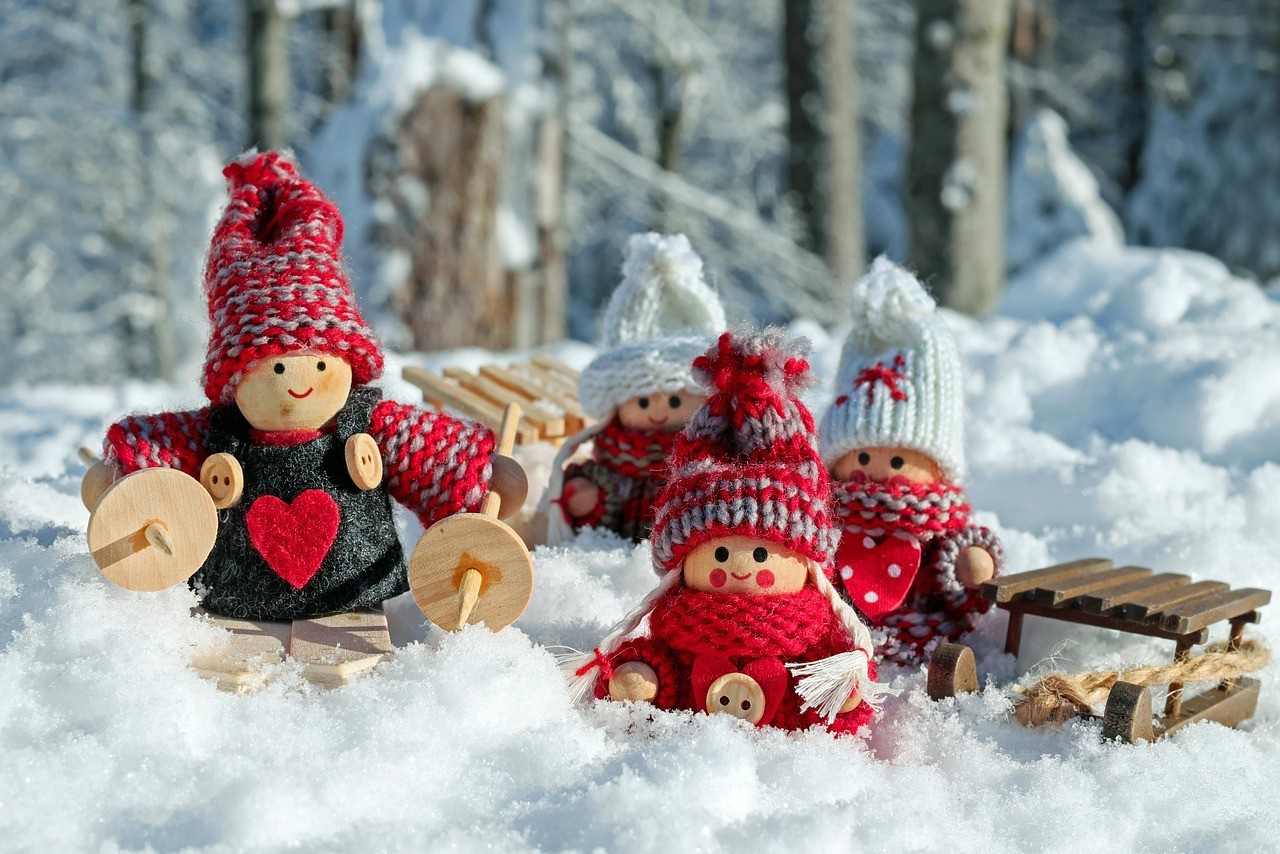 snowman in red and blue coat figurine