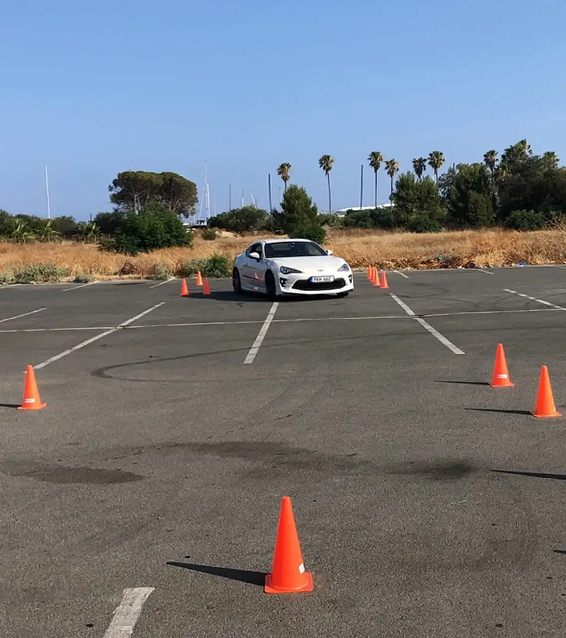 gray mercedes benz coupe on black asphalt road during daytime