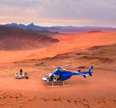 Helicopter landed in Namibian desert