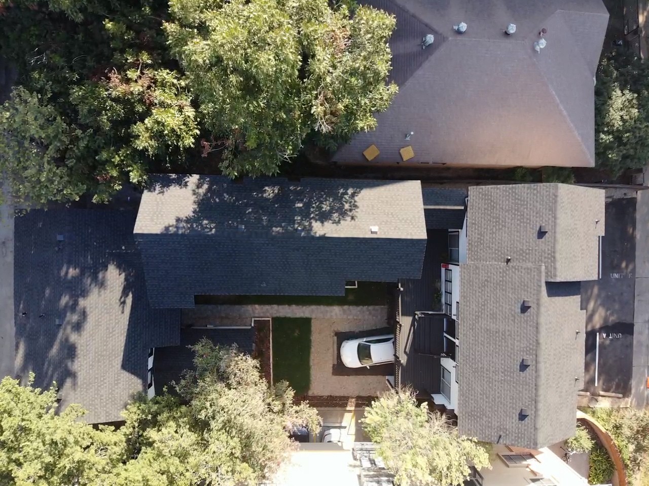 Apartment complex in Austin, Texas, featuring gable roofs with architectural shingles, blending durability and aesthetic appeal.