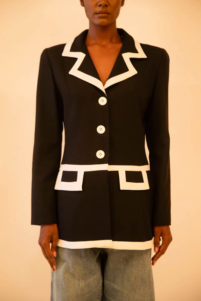 Vintage Sandro black and white fitted blazer featuring sharp tailoring and a classic silhouette, sourced from global designer archives.