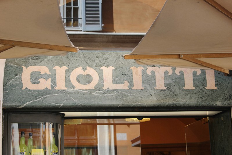 giolitti coffee shop logo on the building wall