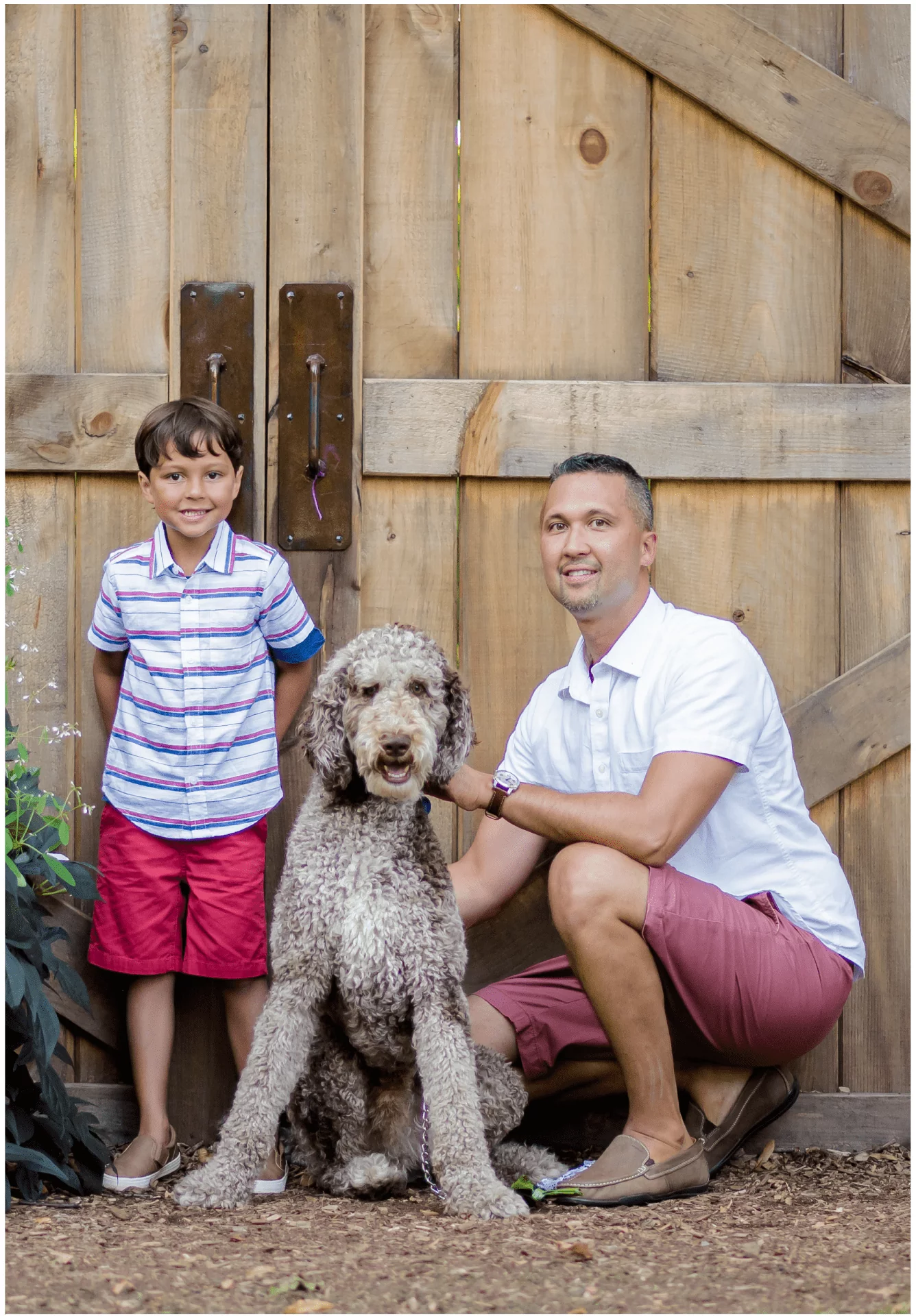 brown wooden table near white wall