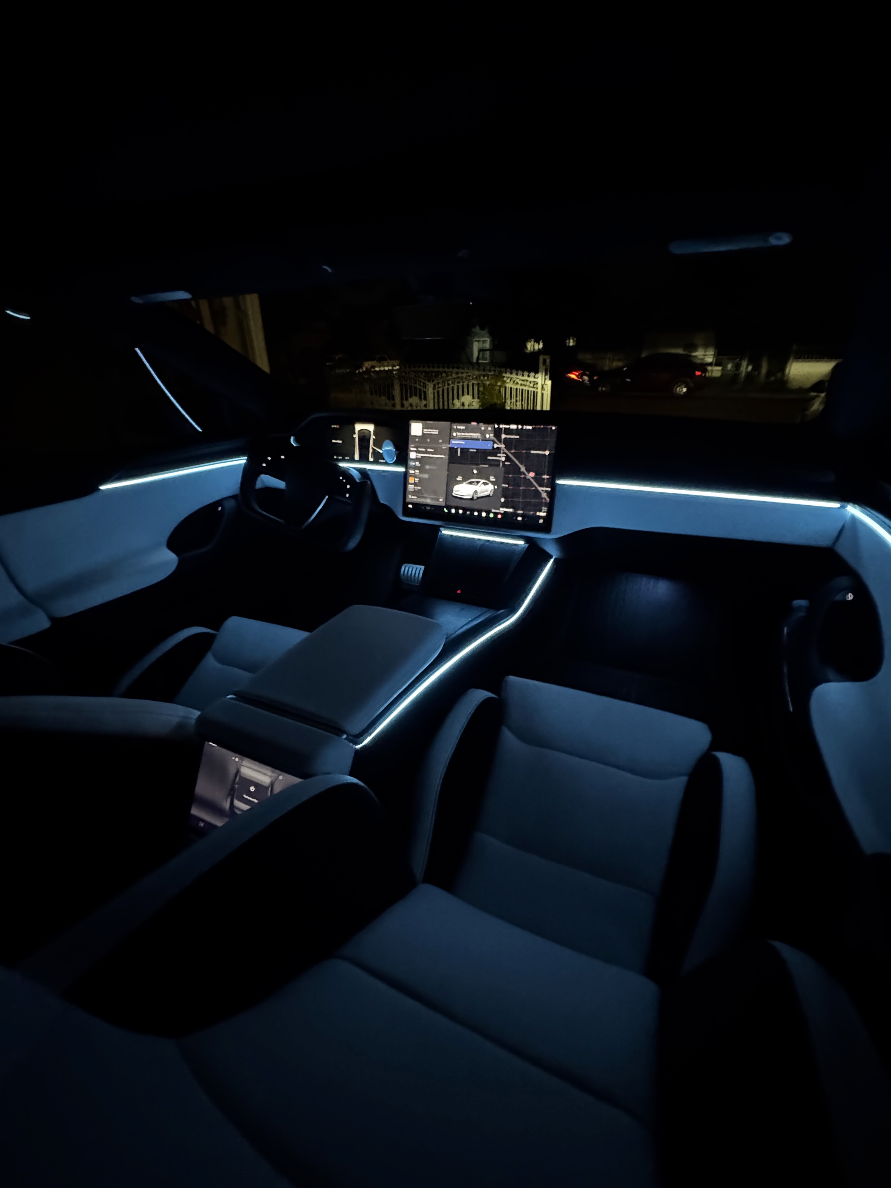 Tesla ambient lighting around door panels — clean factory-look install