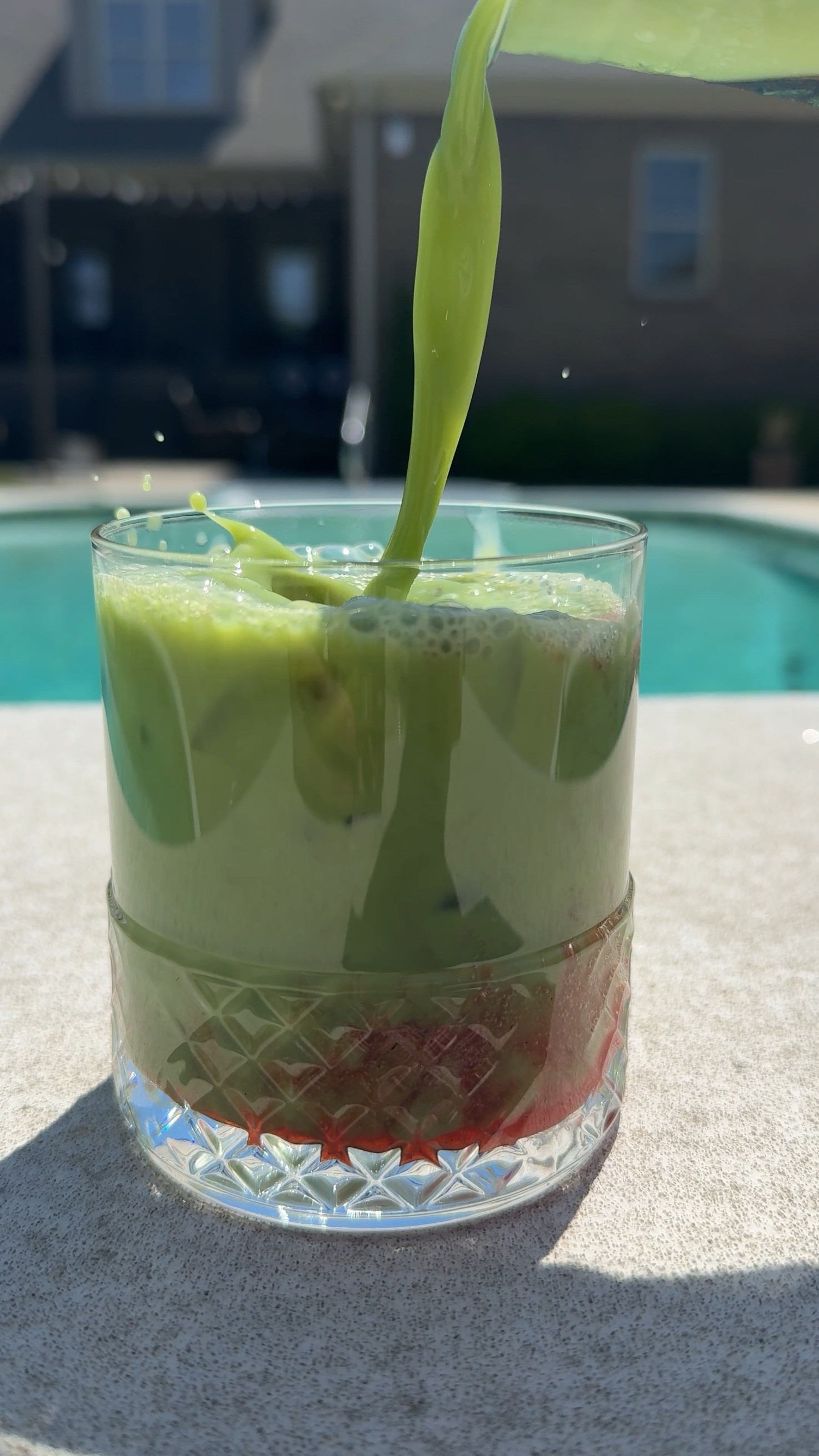 Strawberry matcha made with homemade strawberry syrup