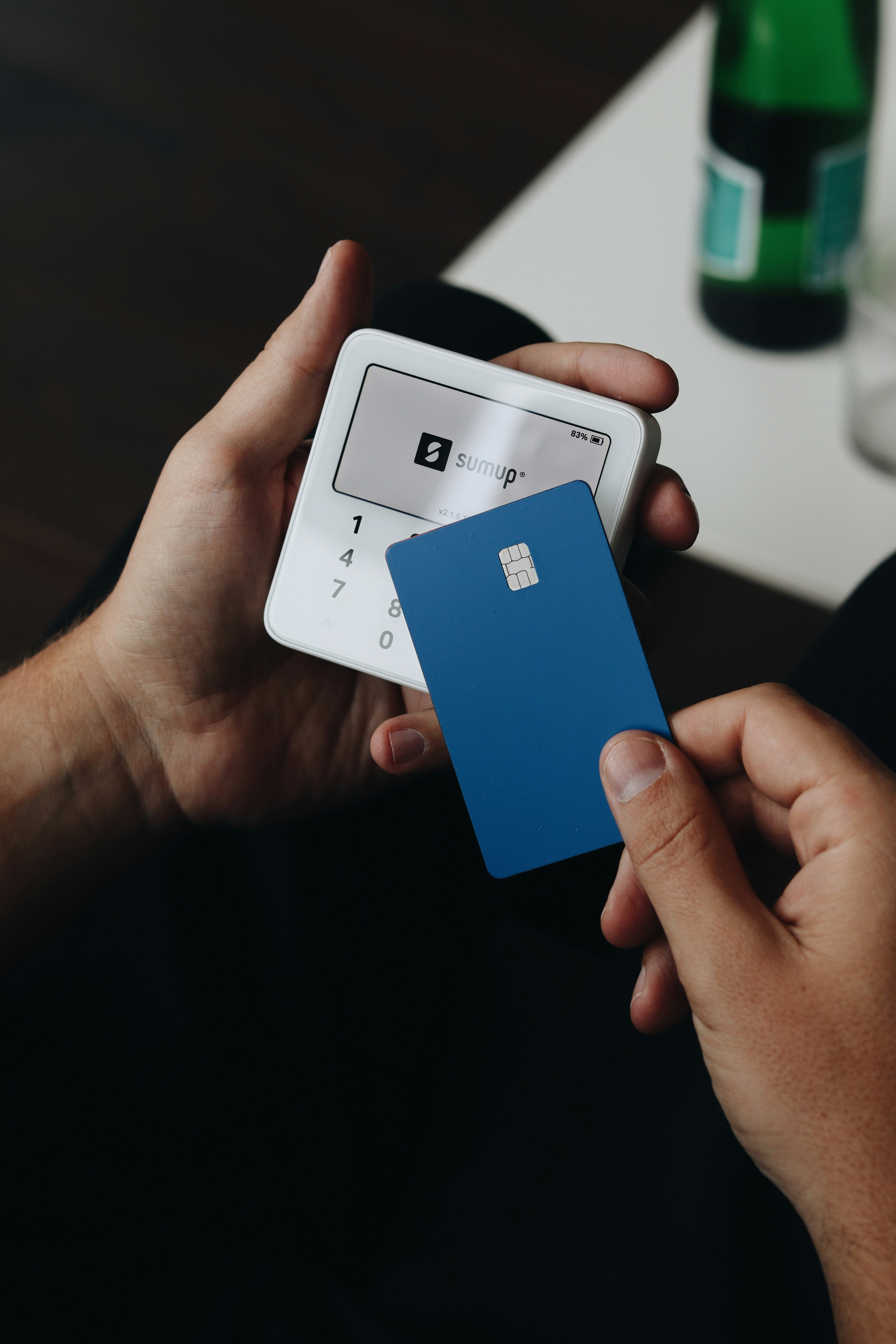 image of a card being swiped over a card reader