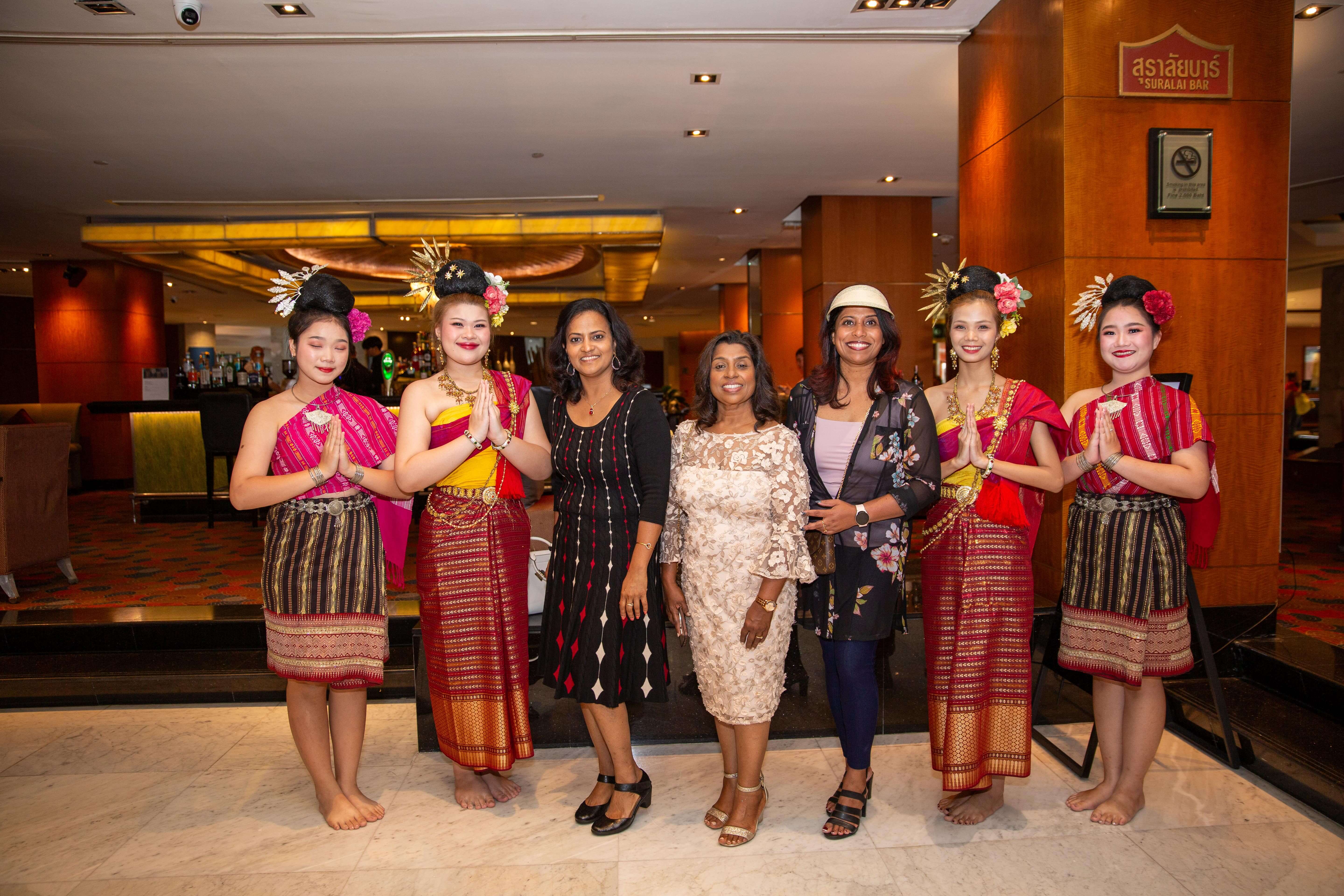 Autumn leaves floating on dark water surface