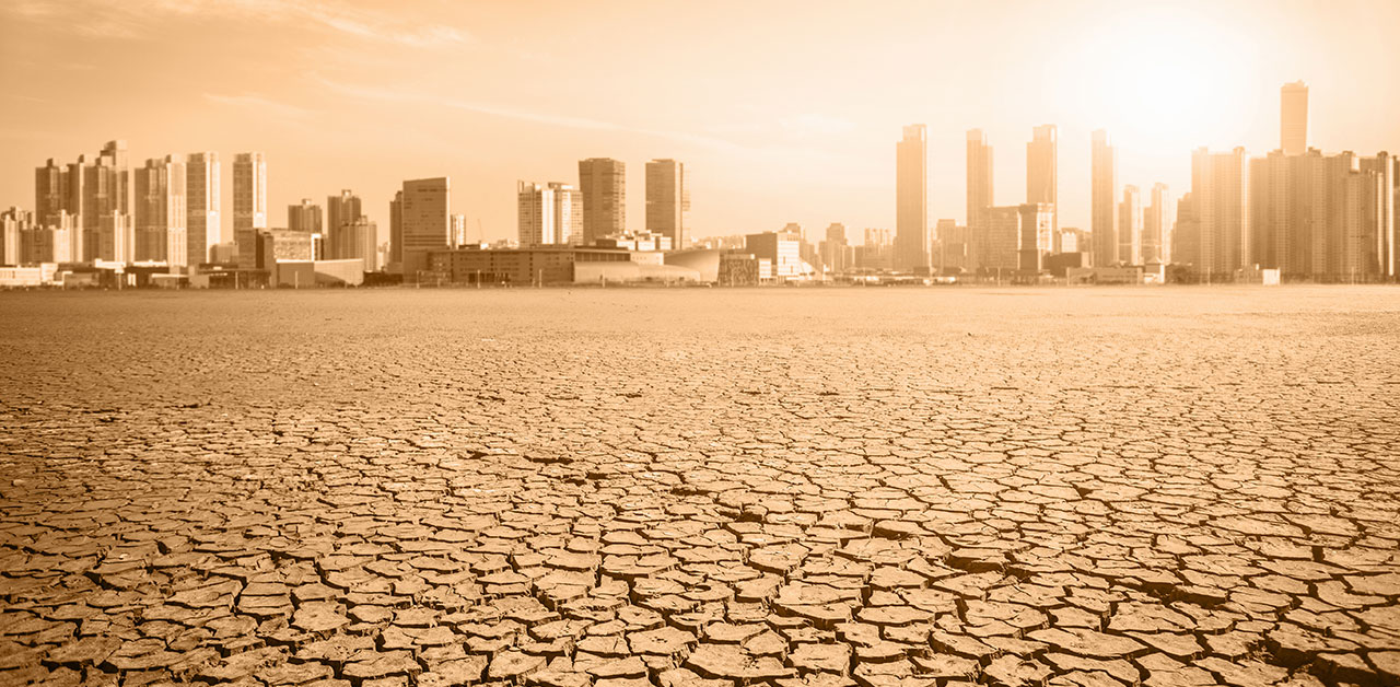 City skyscaper on desert landscape