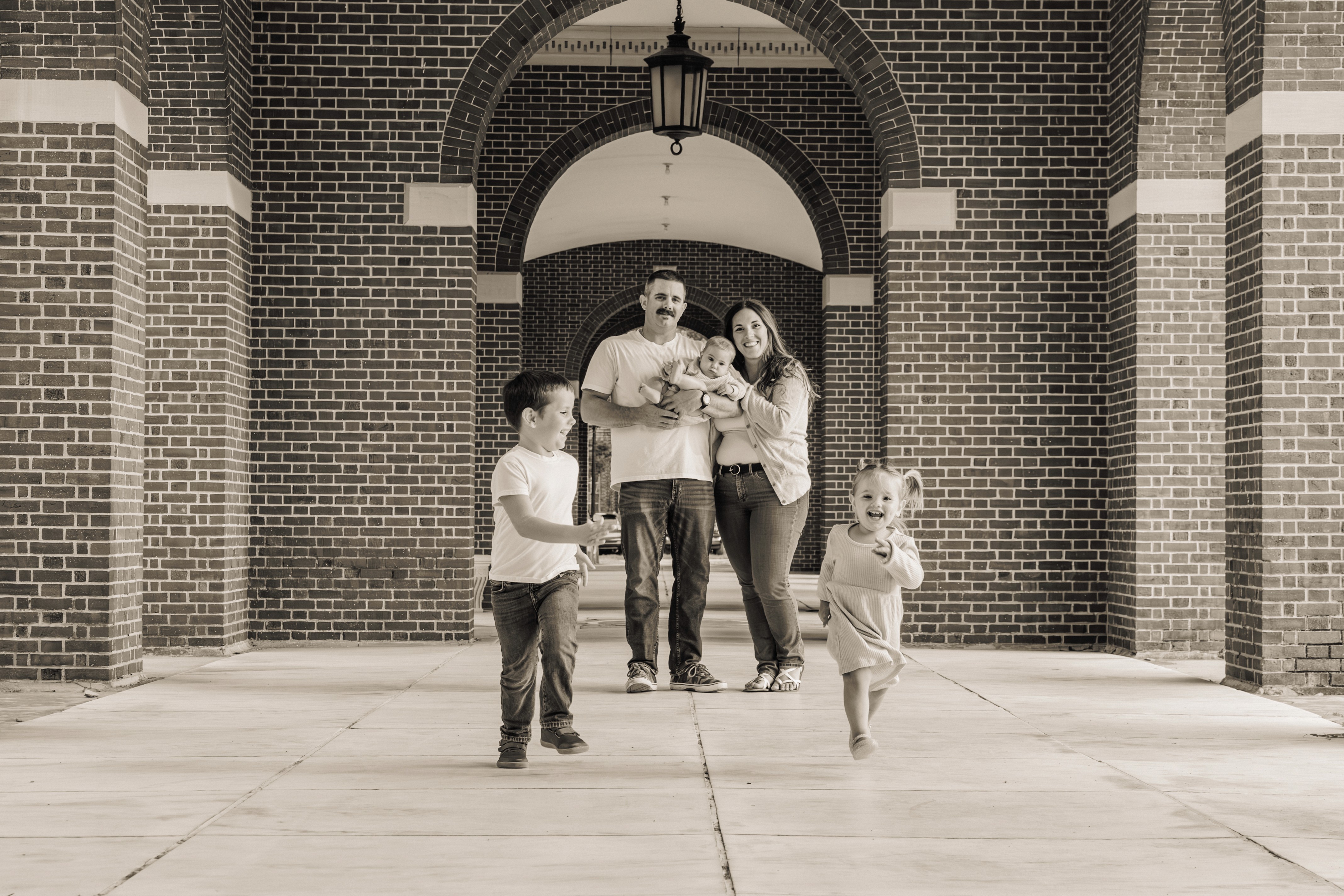 4:59 PMCouple caught in a genuine laugh on the stairs at Bethesda Fountain in Central Park, NYC — fun, unposed couples photography by Lizz Spano Photography, New York City couples photographer.
