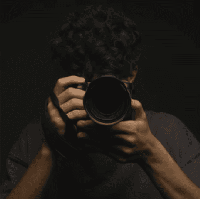 Photographer holding a camera