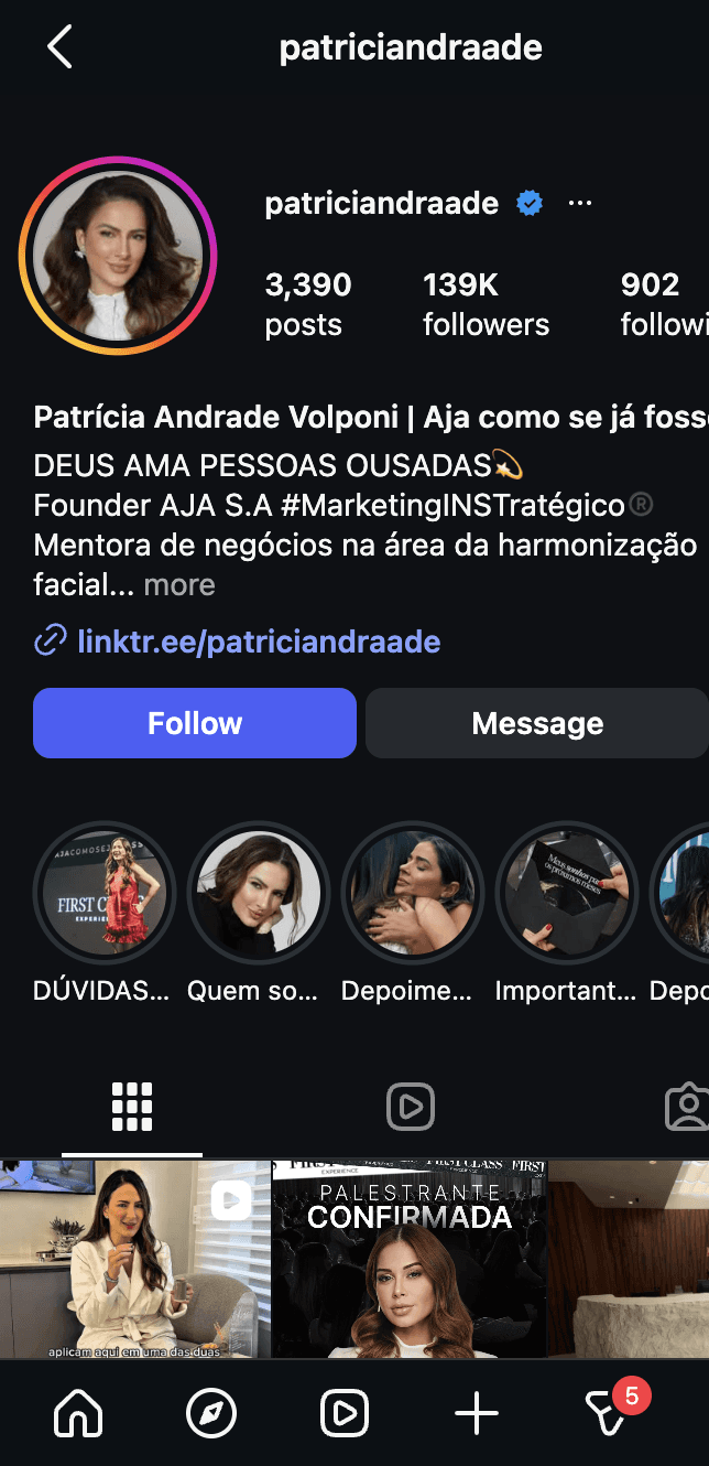 a living room with a couch a table and chairs