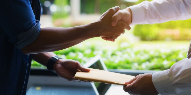 Two people shaking hands