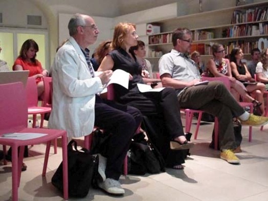 people listening to presentation