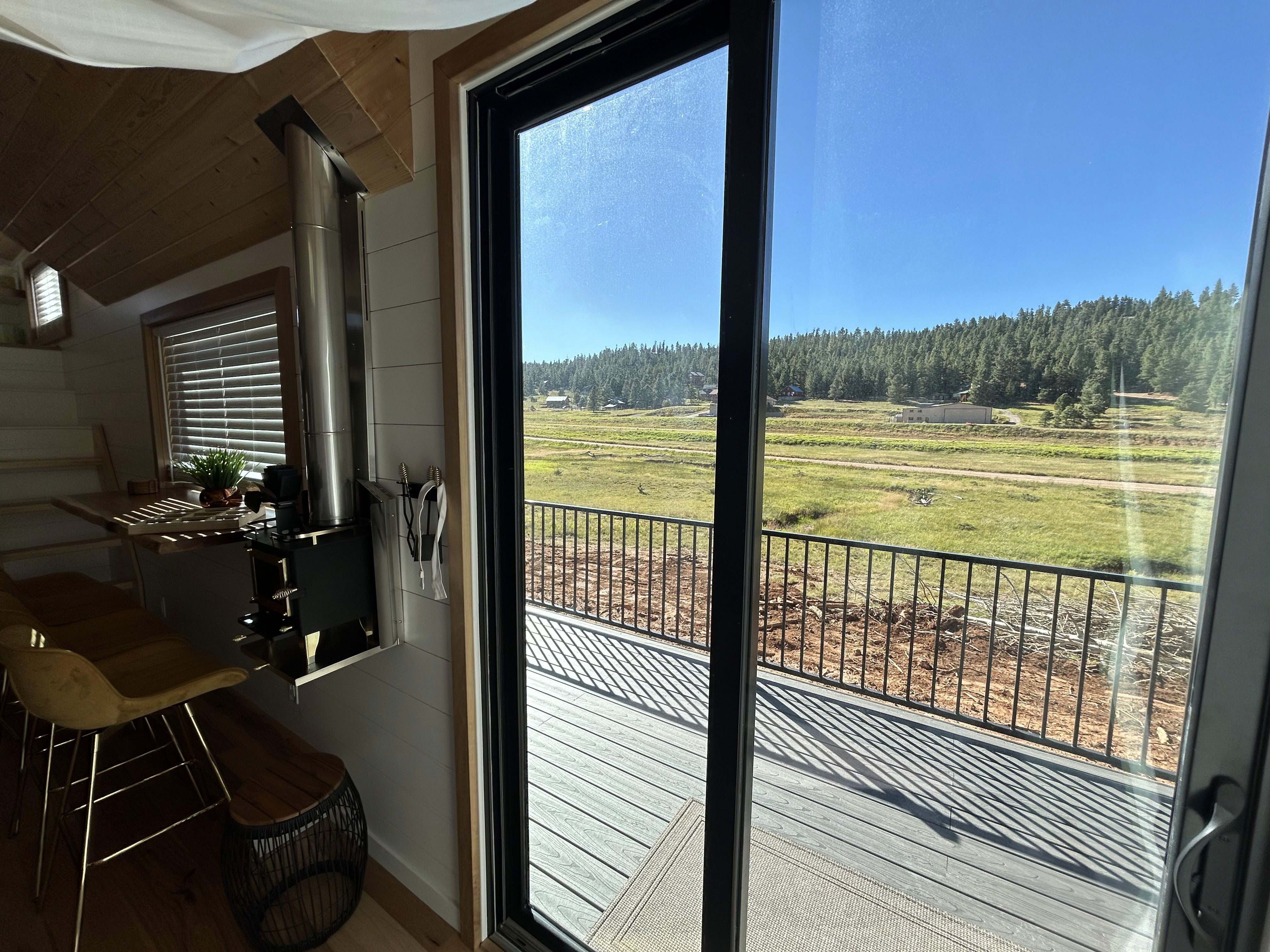 Southern Utah kitchen with sink positioned for valley views through expansive window in St. George