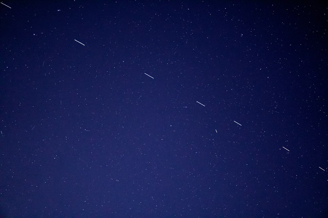 The Starlink 3 train rides across the early morning sky, accompanied by a handful of other satellites.
