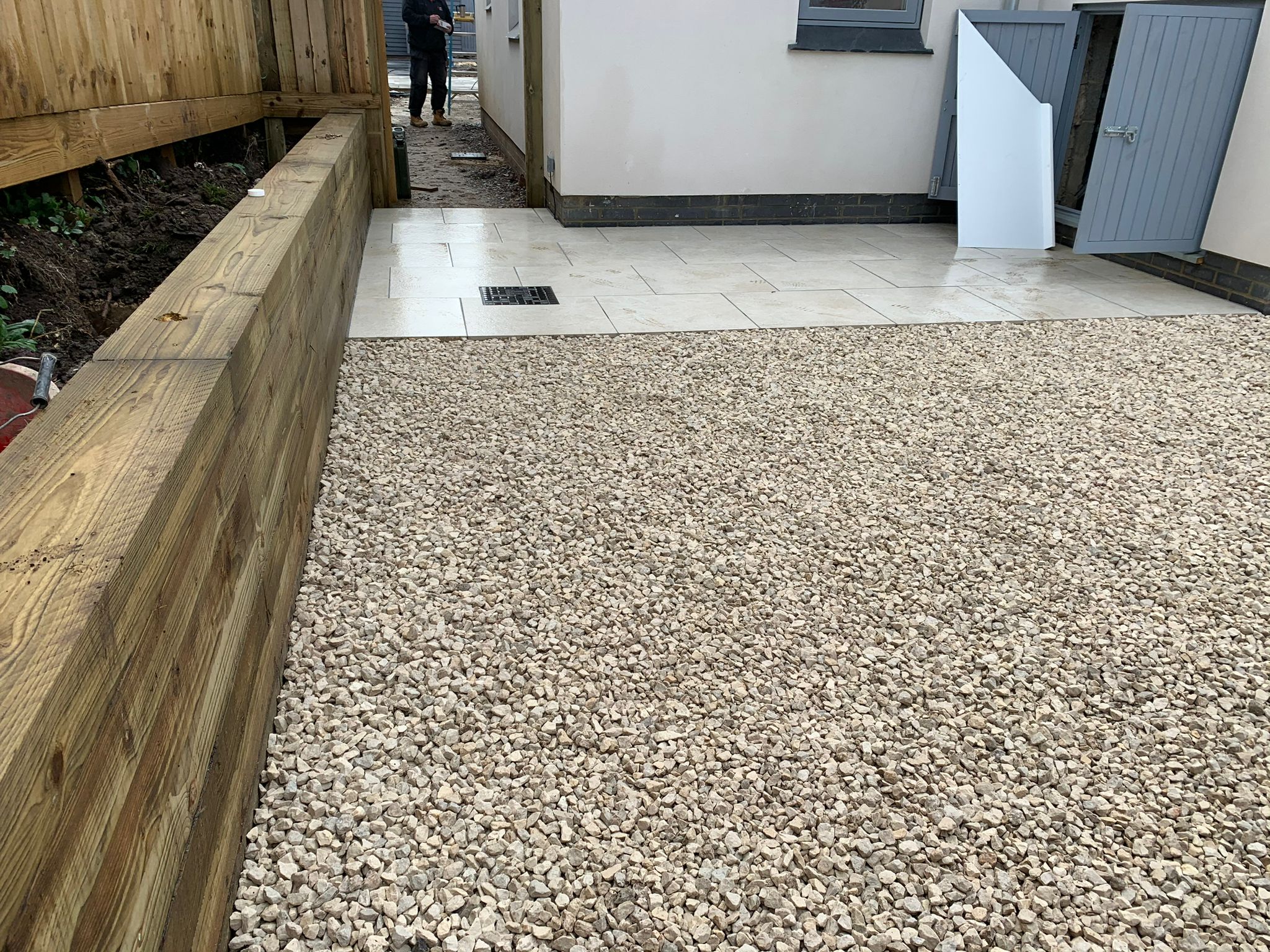 a building under construction with a crane in the background