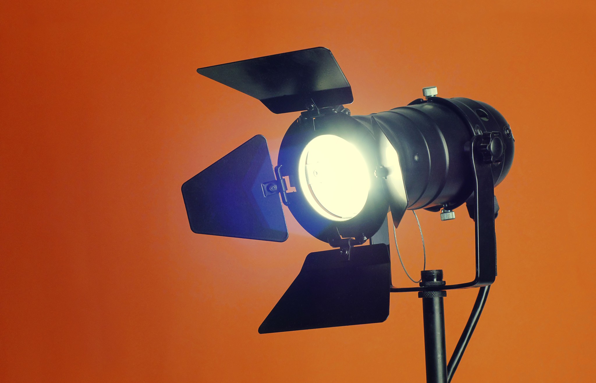 black and gray camera tripod