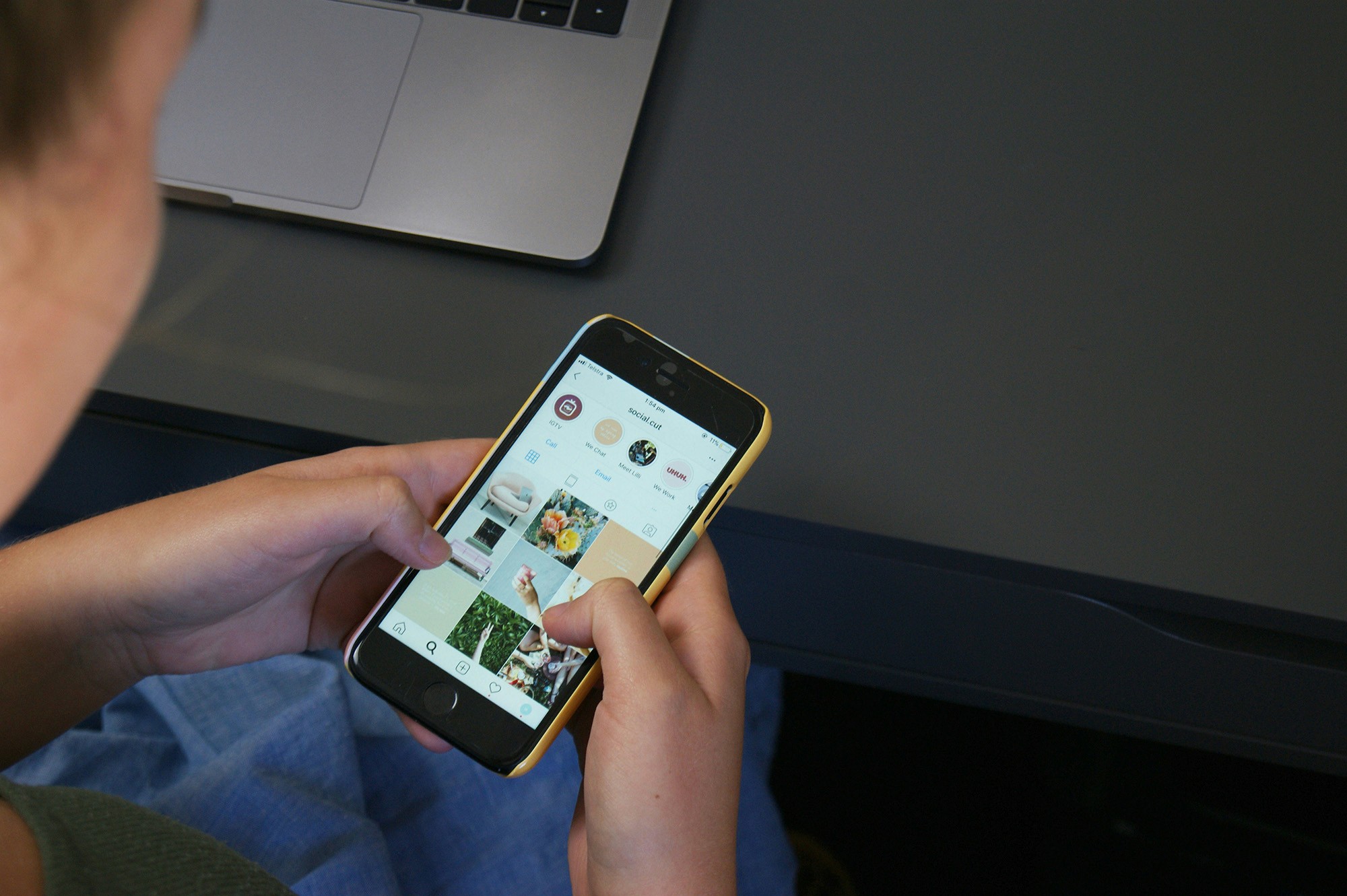 Person using Instagram on their mobile phone