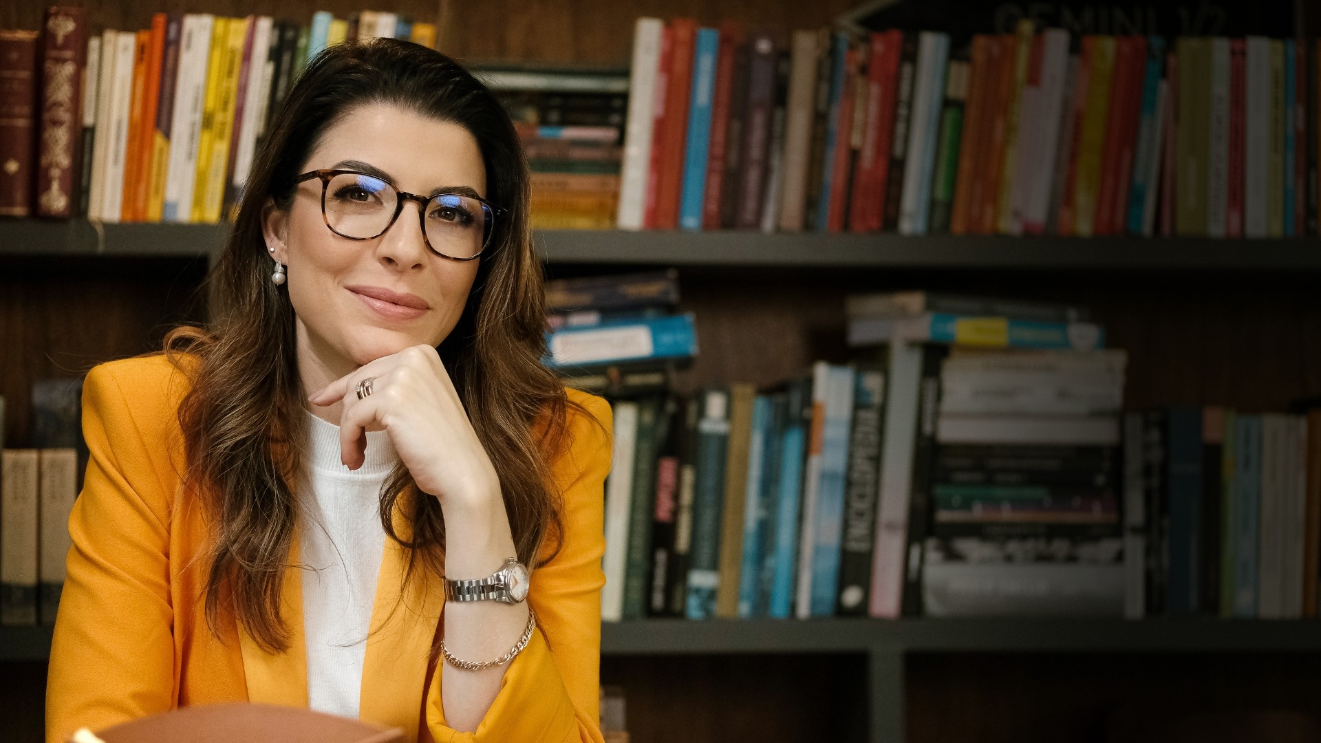 Person pouring Chemical in flask