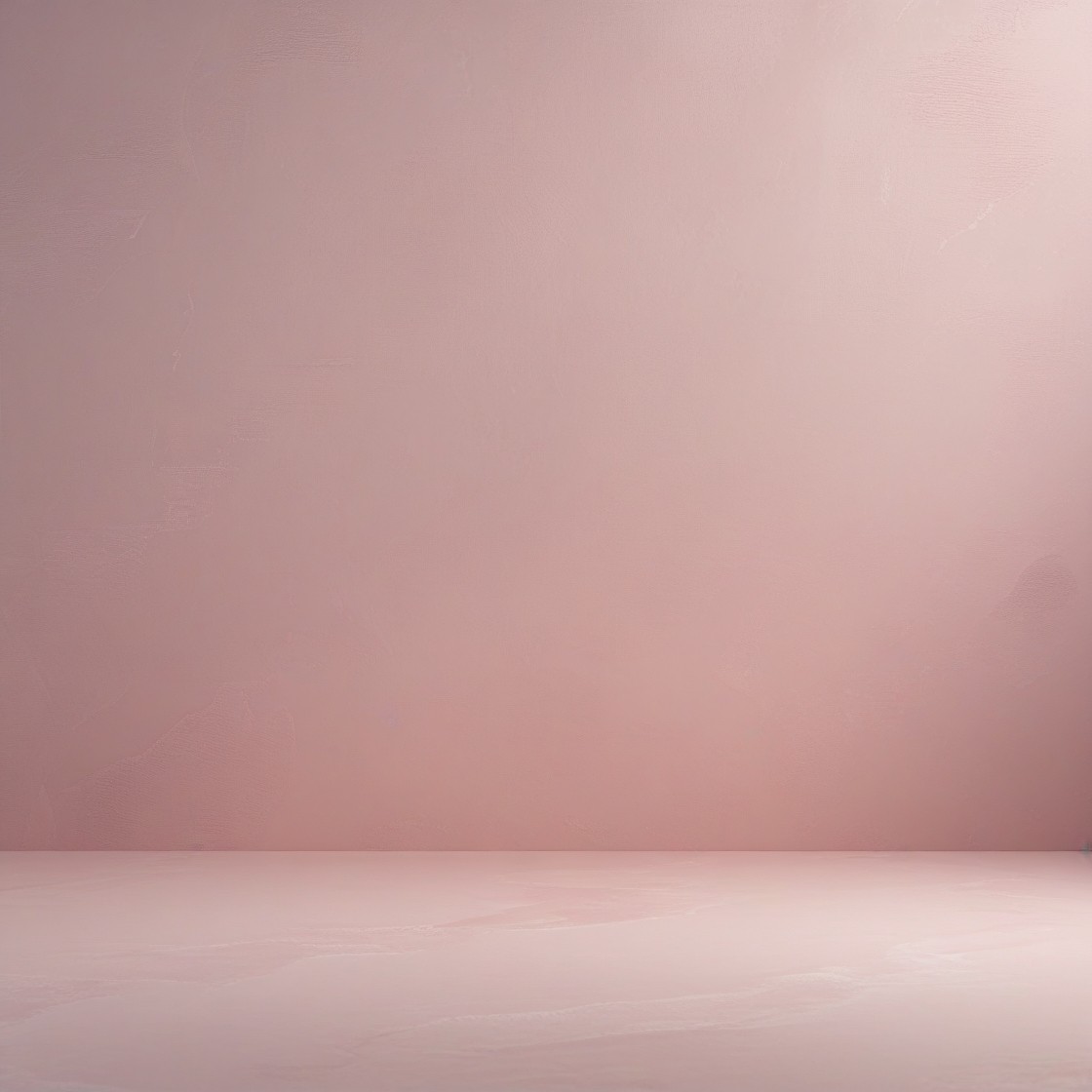 Image of a bare space with muted pink surface and similar coloured wall in the background. The words Be Radiant, Be You scroll up the page.