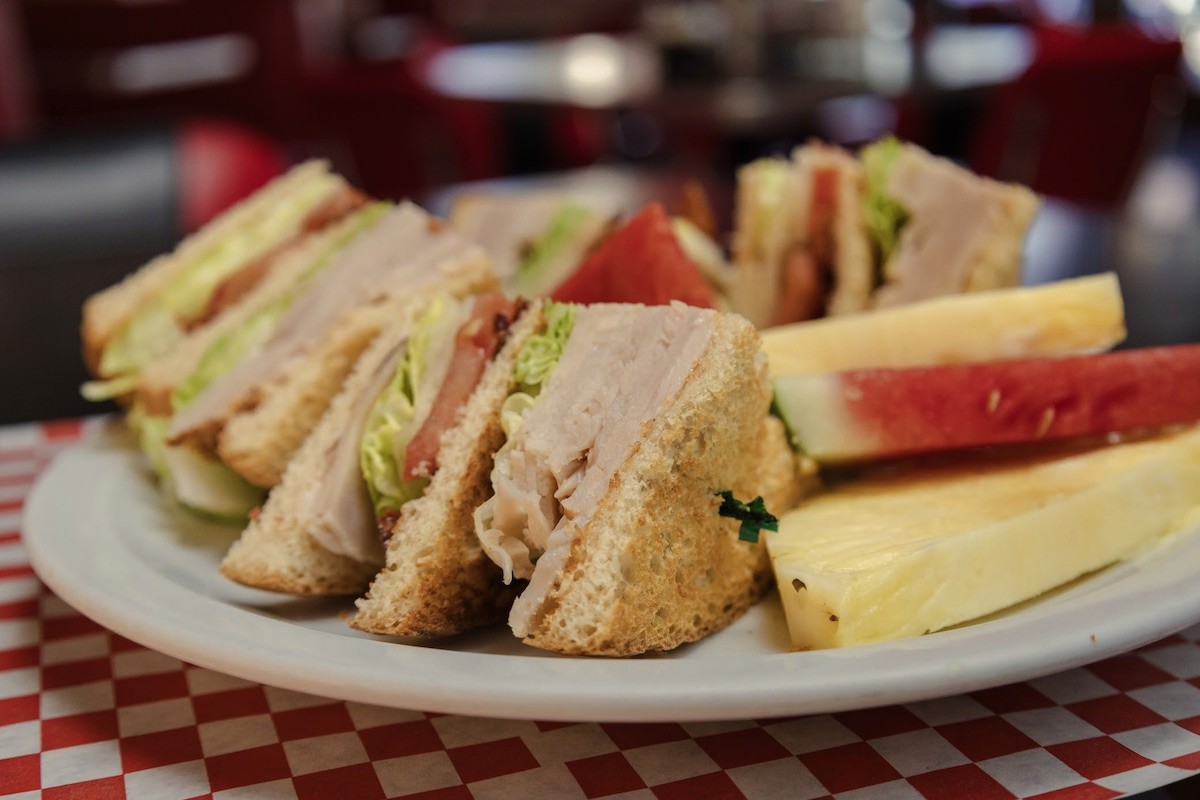 Club Sandwich with watermelon and pineapple