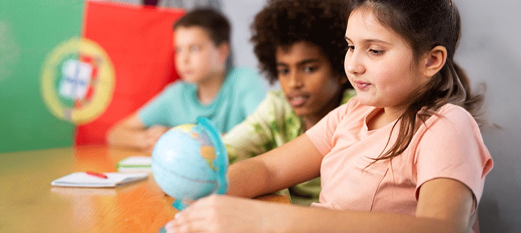 Students learning conversational Portuguese in interactive after school language enrichment class