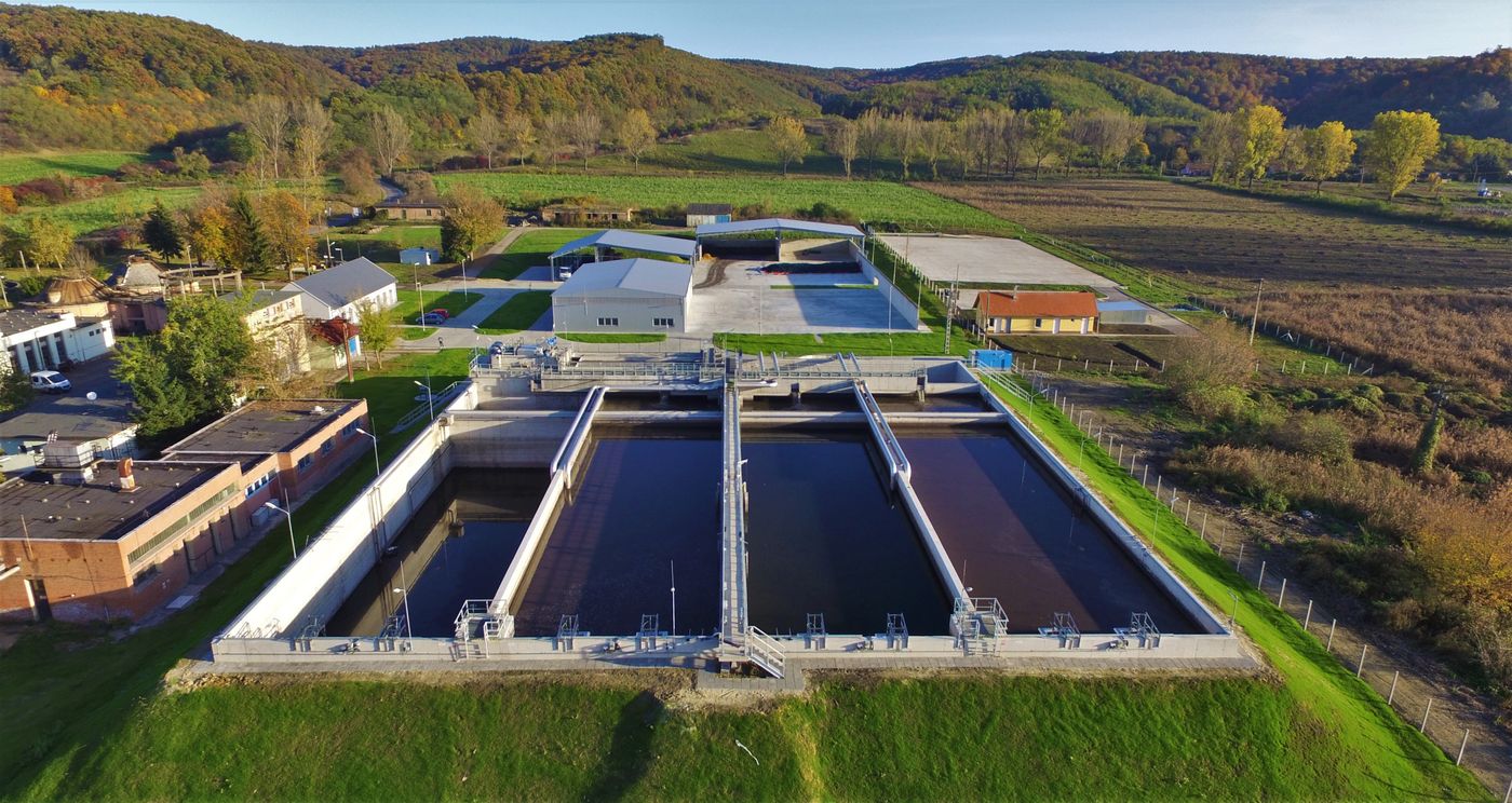 Aerial view of the Ózd municipal wastewater treatment plant and its CYCLATOR basins in the valley, Hungary