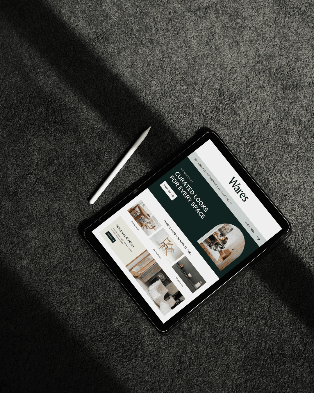 Close-up of a green parrot with an orange beak peeking through green leaves