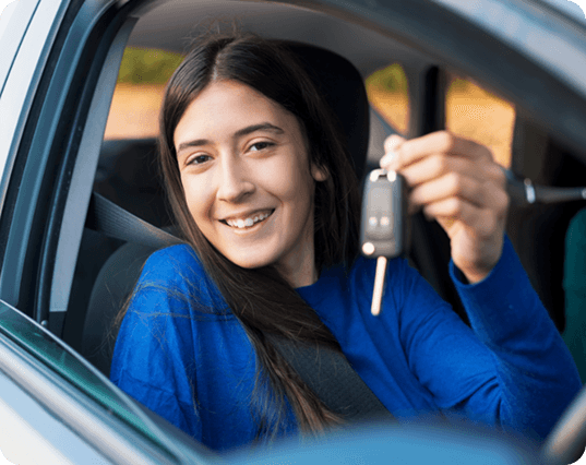 Learner driver with car keys ready for manual and automatic driving lessons near me