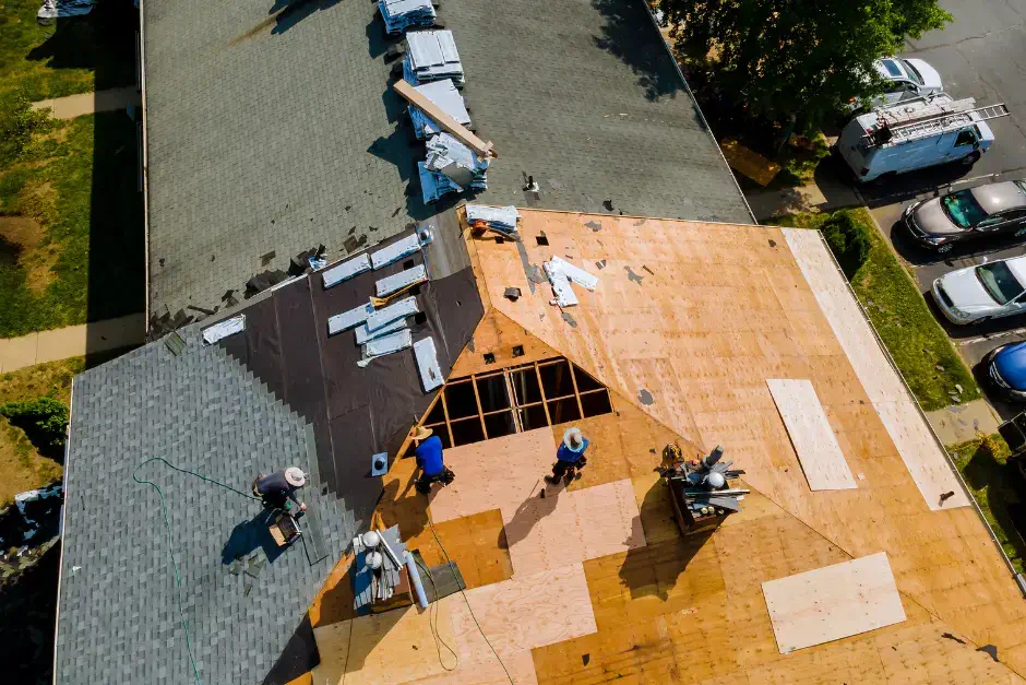 aerial photo of roofers installing new roof