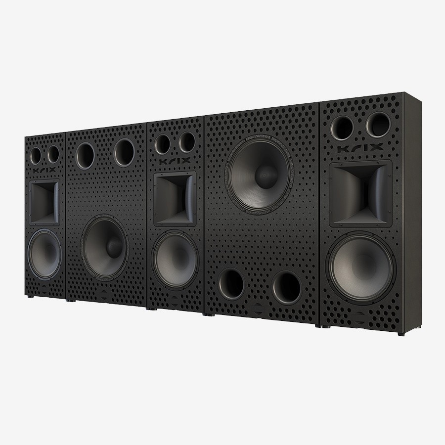 Black speakers with perforated grilles, arranged in a row.