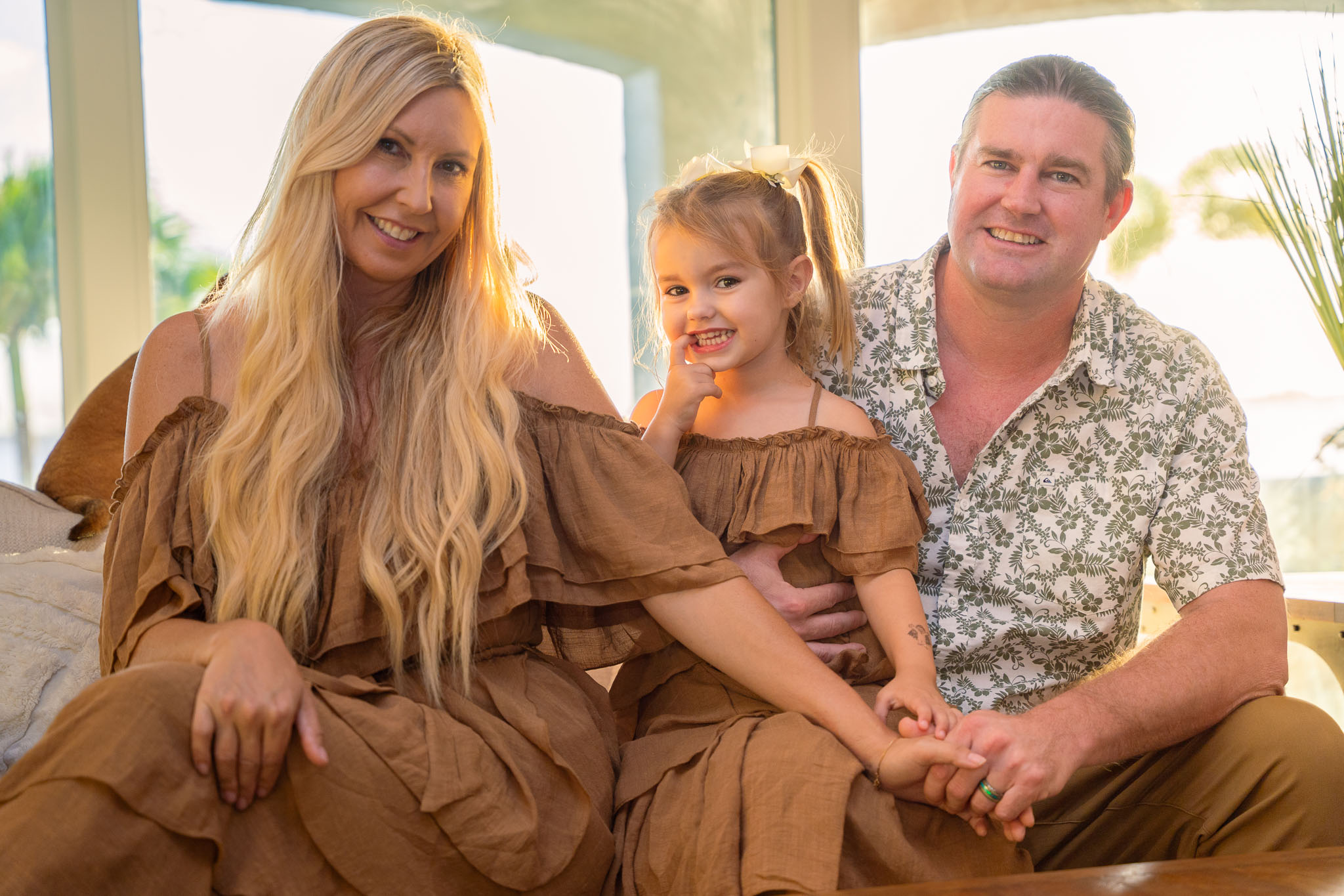 Beautiful portrait of a family in brown clothes
